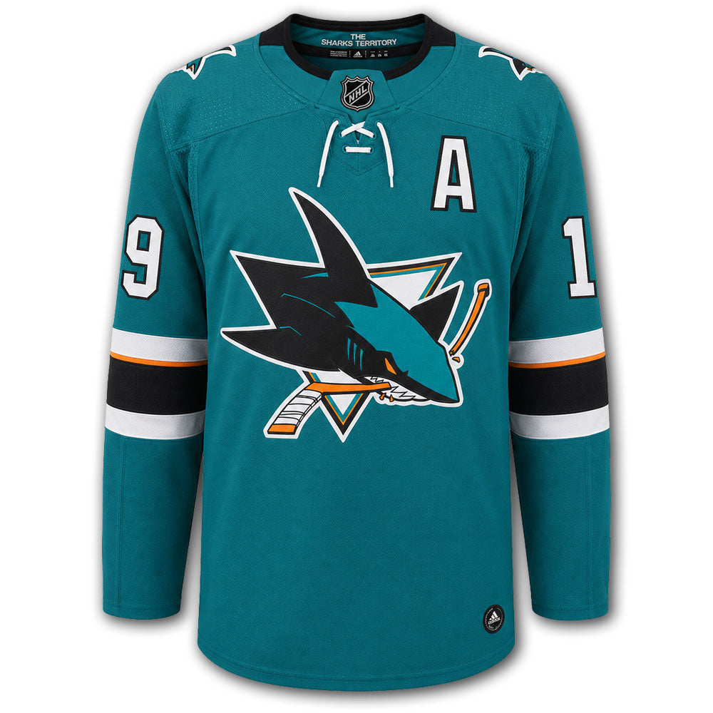 Joe Thornton autographed San Jose Sharks Adidas Pro jersey front with teal home styling, alternate captain A, Sharks crest and number 19 on the sleeves
