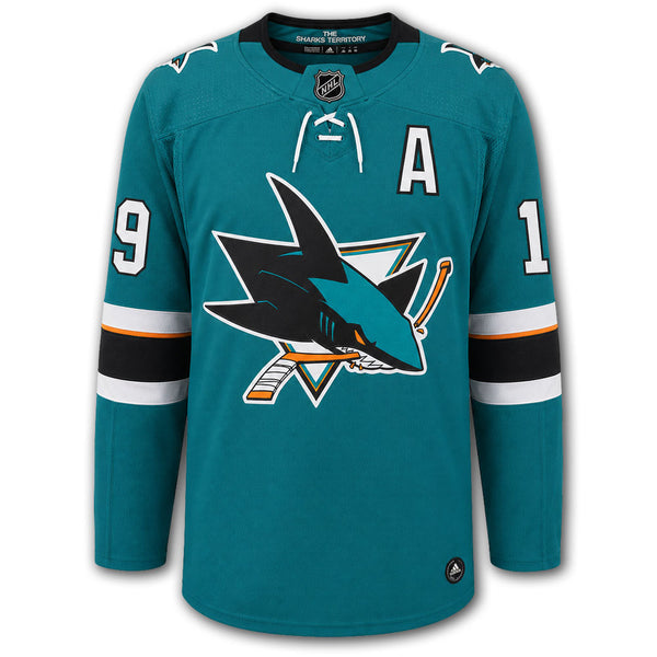 Joe Thornton autographed San Jose Sharks Adidas Pro jersey front with teal home styling, alternate captain A, Sharks crest and number 19 on the sleeves