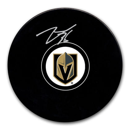 Logan Thompson Vegas Golden Knights signed hockey puck displayed with Certificate of Authenticity.