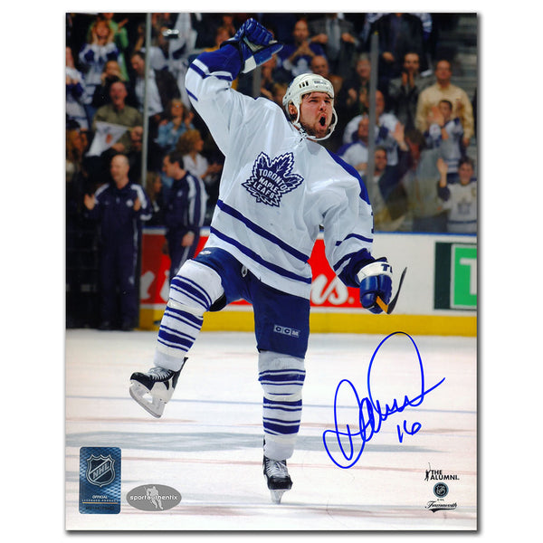 Darcy Tucker autographed Toronto Maple Leafs 8x10 photo in white jersey celebrating on the ice