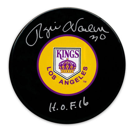 Rogie Vachon autographed Los Angeles Kings puck featuring crown logo and H.O.F. 16 inscription—ideal signed memorabilia.