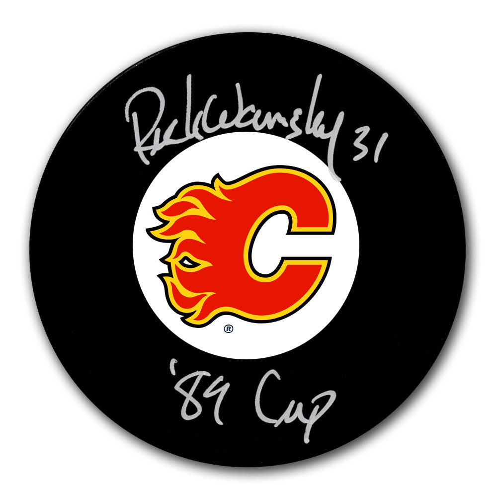 Rick Wamsley autographed Calgary Flames hockey puck with 1989 Cup inscription