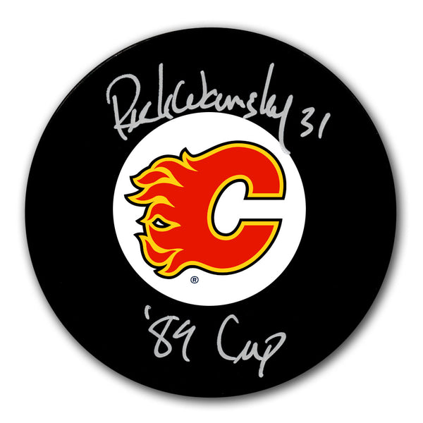 Rick Wamsley autographed Calgary Flames hockey puck with 1989 Cup inscription