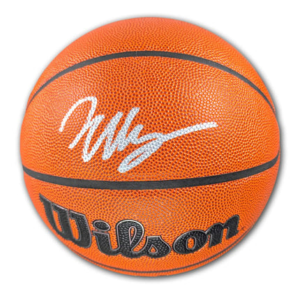 Victor Wembanyama signed Wilson NBA basketball with visible signature, authenticated by Fanatics, collectible sports memorabilia.