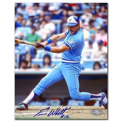 Autographed 8x10 photo of Ernie Whitt swinging bat in Blue Jays uniform, signed boldly with LINE DRIVE inscription.