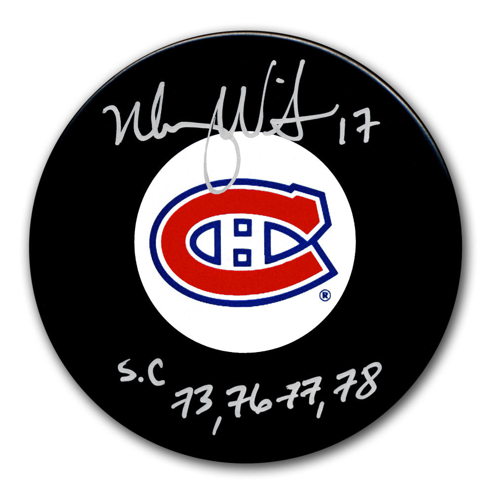 Murray Wilson autographed Montreal Canadiens hockey puck with 4x Stanley Cup inscription