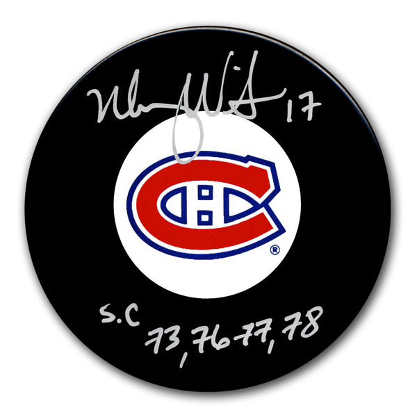 Murray Wilson autographed Montreal Canadiens hockey puck with 4x Stanley Cup inscription