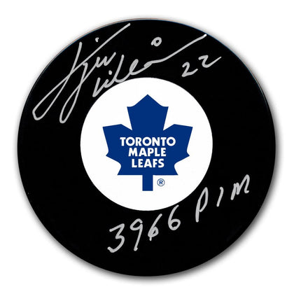 Tiger Williams Toronto Maple Leafs hockey puck, signed in white ink with 3966 PIMS inscription, authentic autographed memorabilia.