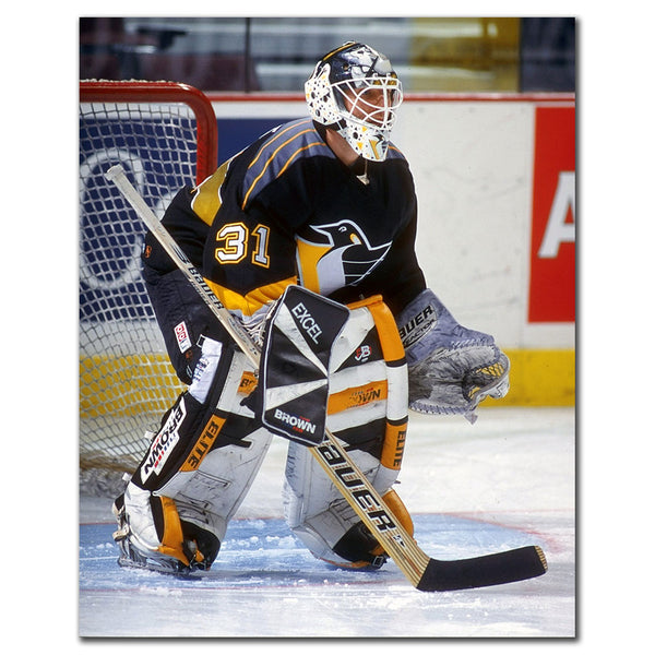 Ken Wregget tending goal in a black Pittsburgh Penguins uniform