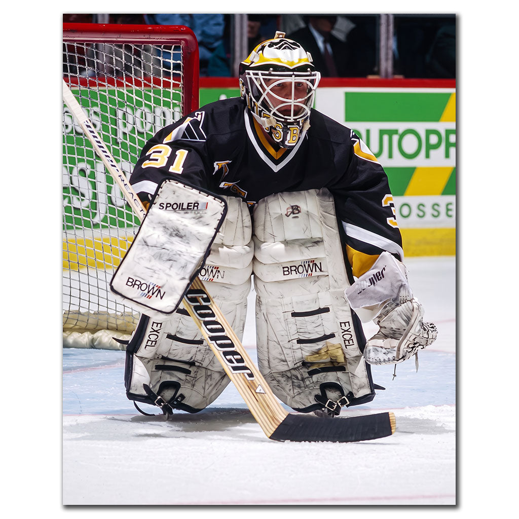 Ken Wregget guarding the net in a black Pittsburgh Penguins uniform