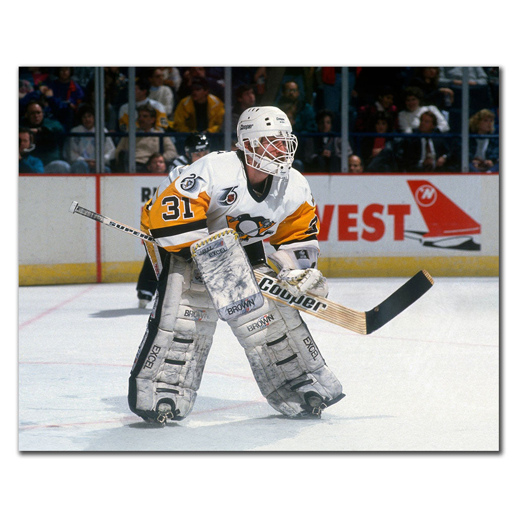 Ken Wregget tending goal in a white Pittsburgh Penguins uniform