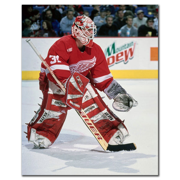 Ken Wregget tending goal in a red Detroit Red Wings uniform