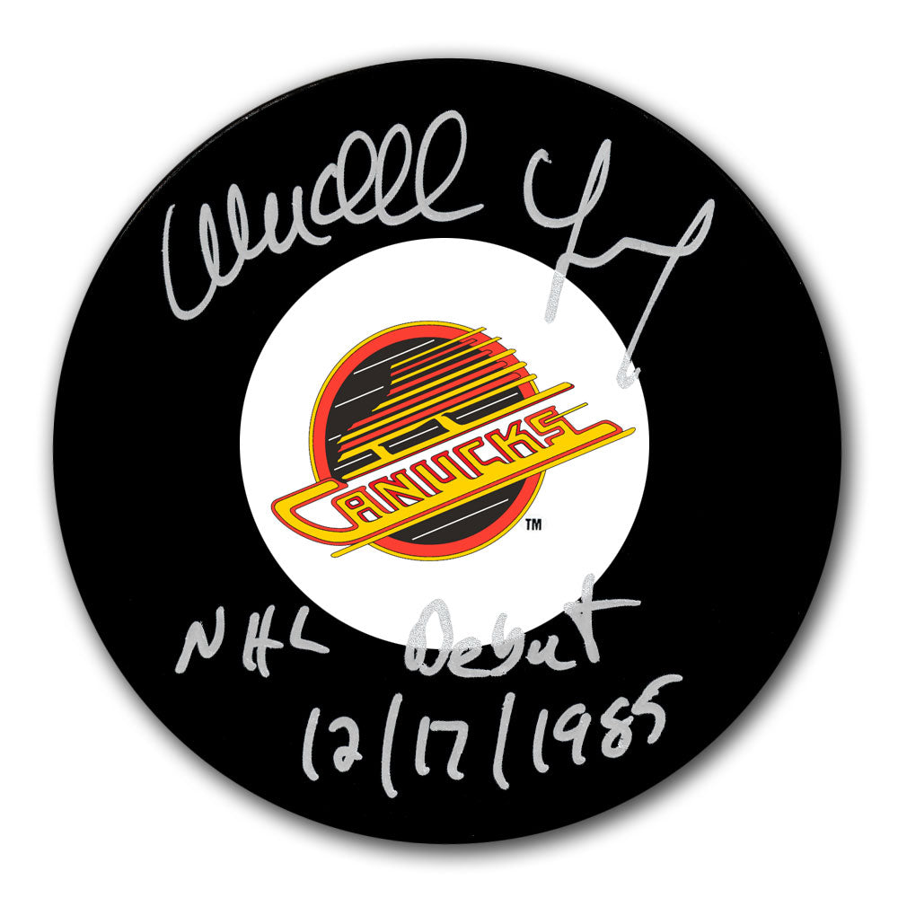 Wendell Young Vancouver Canucks NHL Debut 12-17-85 Autographed Puck - Sport Authentix Inc